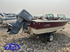 1984 LUND 16' BOAT W/ 2018 EZ LOADER TRAILER