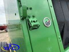 2015 JOHN DEERE 569 ROUND BALER