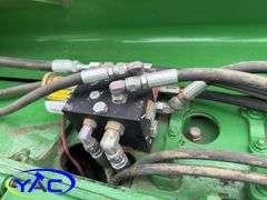 2015 JOHN DEERE 569 ROUND BALER