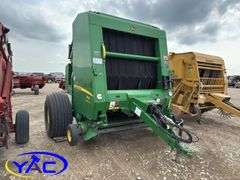 2015 JOHN DEERE 569 ROUND BALER