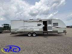 2007  KEYSTONE  OUTBACK BUMPER HITCH CAMPER