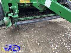 2015 JOHN DEERE 569 ROUND BALER