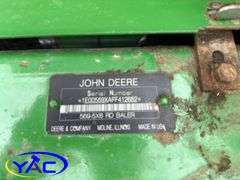 2015 JOHN DEERE 569 ROUND BALER