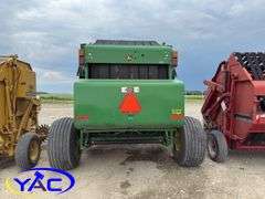 2015 JOHN DEERE 569 ROUND BALER