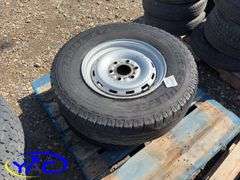 2- 245/75R16 Tires & Rims From A Trailer. (Rims Only. Tires Worn And Cracked)