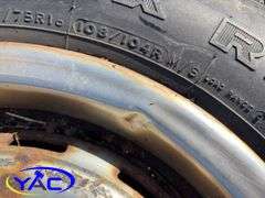 2- 245/75R16 Tires & Rims From A Trailer. (Rims Only. Tires Worn And Cracked)