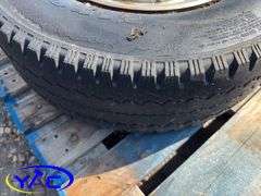 2- 245/75R16 Tires & Rims From A Trailer. (Rims Only. Tires Worn And Cracked)