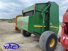 2015 JOHN DEERE 569 ROUND BALER