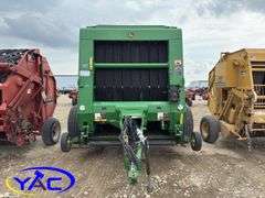 2015 JOHN DEERE 569 ROUND BALER