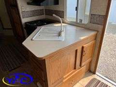 2005  KEYSTONE  BUMPER HITCH CAMPER