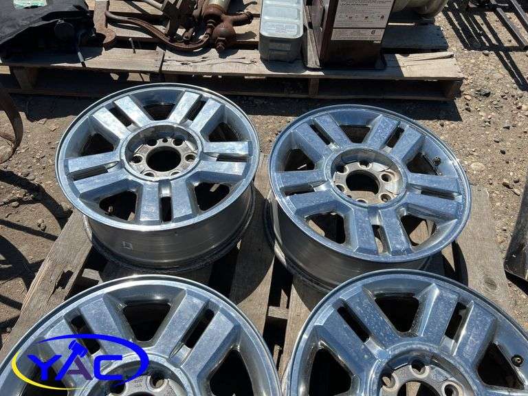 4- 18" Aluminum Ford Rims W/ Center Caps & Lug Nuts
