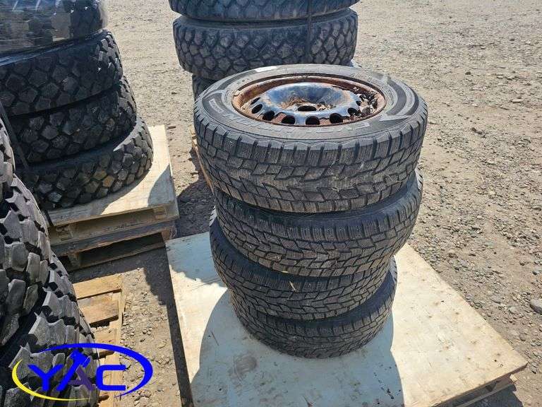 4- 205/65R16 Winter Tires On Rims