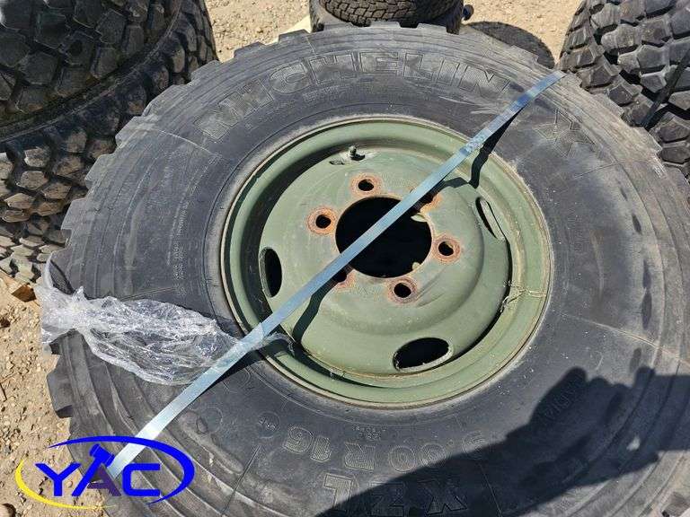 4 - 9.00R16 Tires On Rims (BUYER MUST PAY 4X THE BID PRICE)