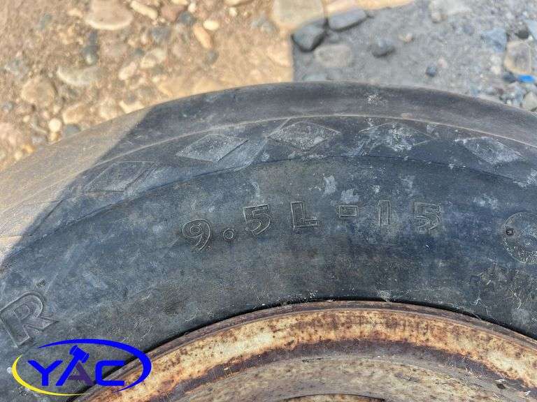 9.5L-15 Tire W/ Rim