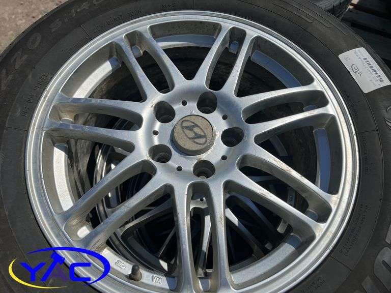 4 - 225/65R17 Tires & Rims