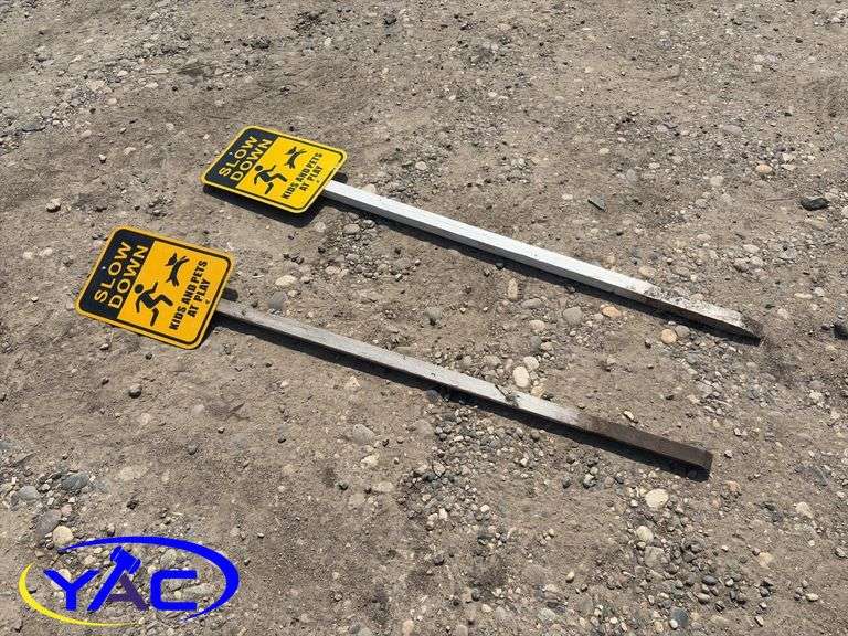 2- Slow Down Signs