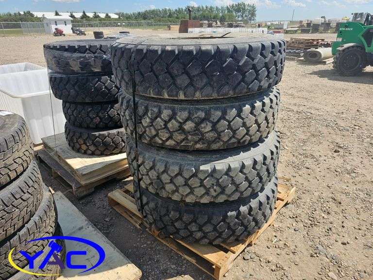 4 - 11.00R20 Tires on Rims (BUYER MUST PAY 4X THE BID PRICE)