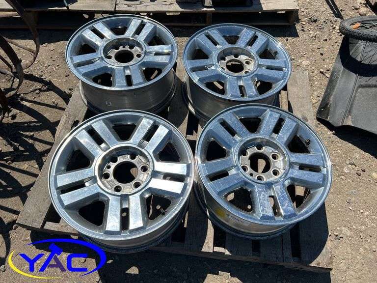 4- 18" Aluminum Ford Rims W/ Center Caps & Lug Nuts