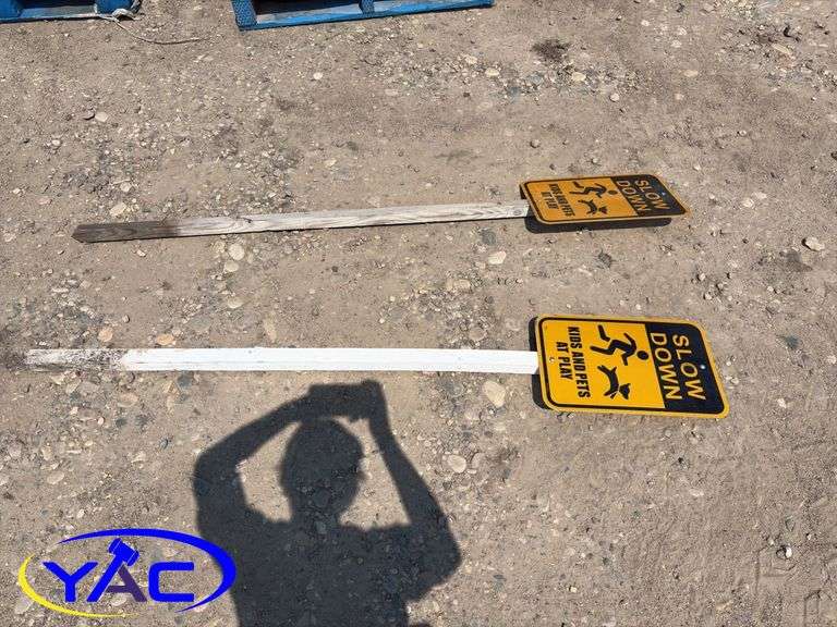 2- Slow Down Signs