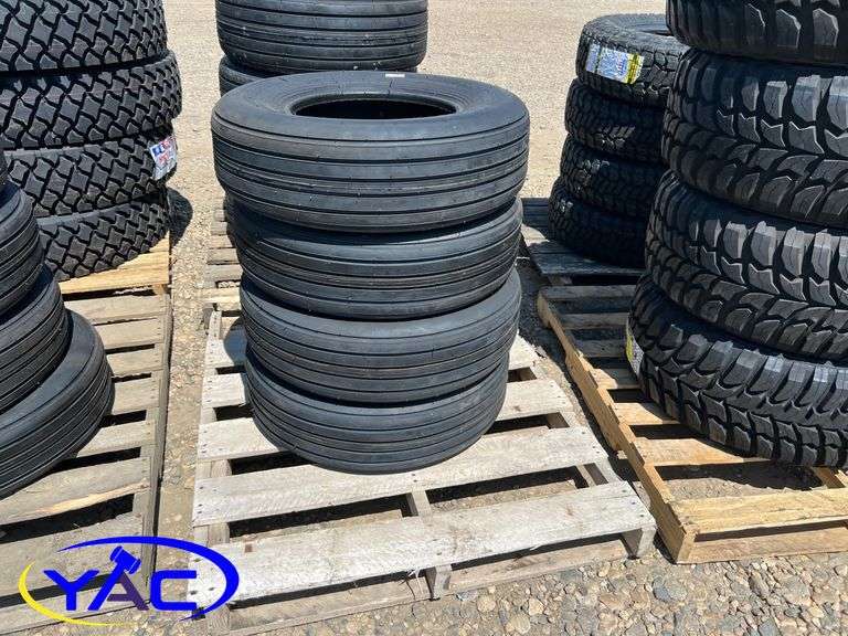 4- 9.5L-15 Implement Tires  (BIDDER MUST PAY 4X THE BID PRICE)