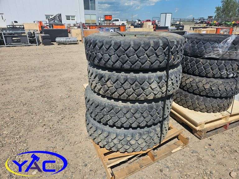 4 - 11.00R20 Tires on Rims (BUYER MUST PAY 4X THE BID PRICE)