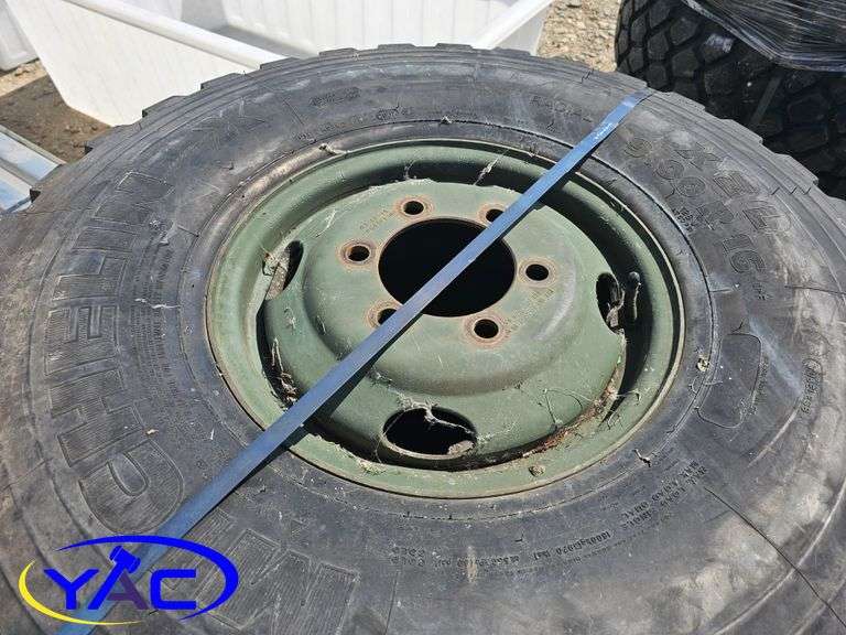 4 - 9.00R16 Tires On Rims (BUYER MUST PAY 4X THE BID PRICE)