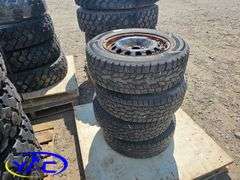 4- 205/65R16 Winter Tires On Rims