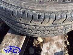 2- Bridgestone Dueler 235/70R17 Tires