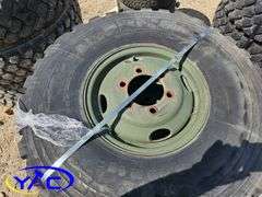 4 - 9.00R16 Tires On Rims (BUYER MUST PAY 4X THE BID PRICE)