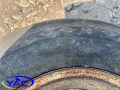 9.5L-15 Tire W/ Rim