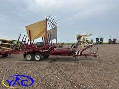 NEW HOLLAND 1033 BALE STACKER