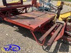 NEW HOLLAND SQUARE BALE PICKER