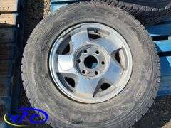 4- 245/75R16 Tires & Rims (Rims Only. Tires Cracked)