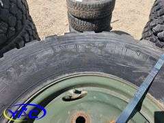 4 - 9.00R16 Tires On Rims (BUYER MUST PAY 4X THE BID PRICE)