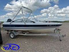 1987 BAYLINER CAPRI BOAT W/ 2004 EZ-LOADER TRAILER