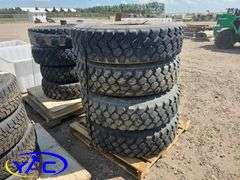 4 - 11.00R20 Tires on Rims (BUYER MUST PAY 4X THE BID PRICE)