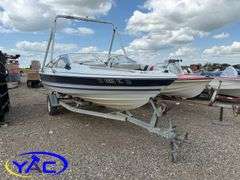1987 BAYLINER CAPRI BOAT W/ 2004 EZ-LOADER TRAILER