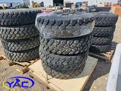 4 - 9.00R16 Tires On Rims (BUYER MUST PAY 4X THE BID PRICE)