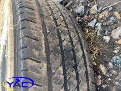 2- Bridgestone Dueler 235/70R17 Tires