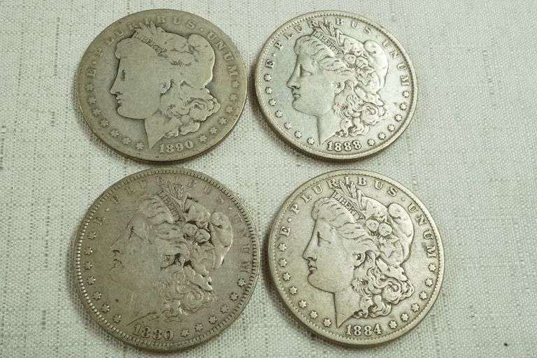 Lot of (4) Morgan Silver Dollars