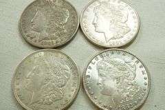 Lot of (4) Morgan Silver Dollars