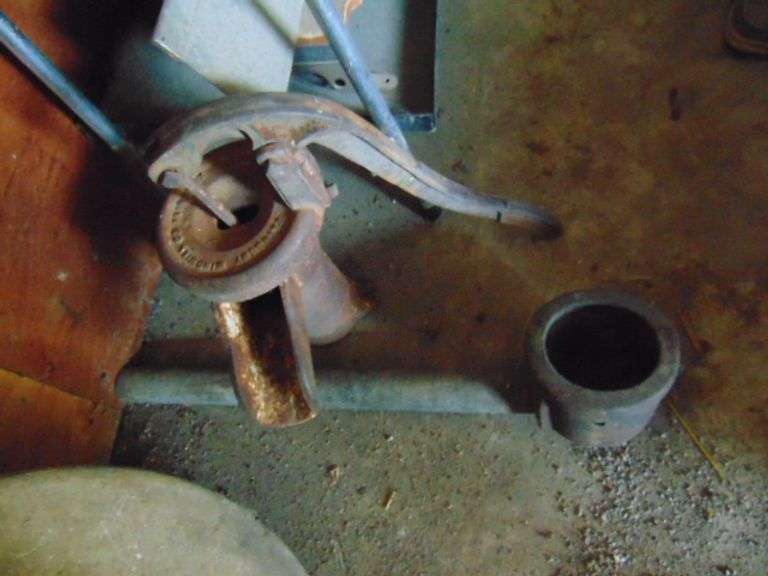 2 GRINDING STONES W WELL PUMP