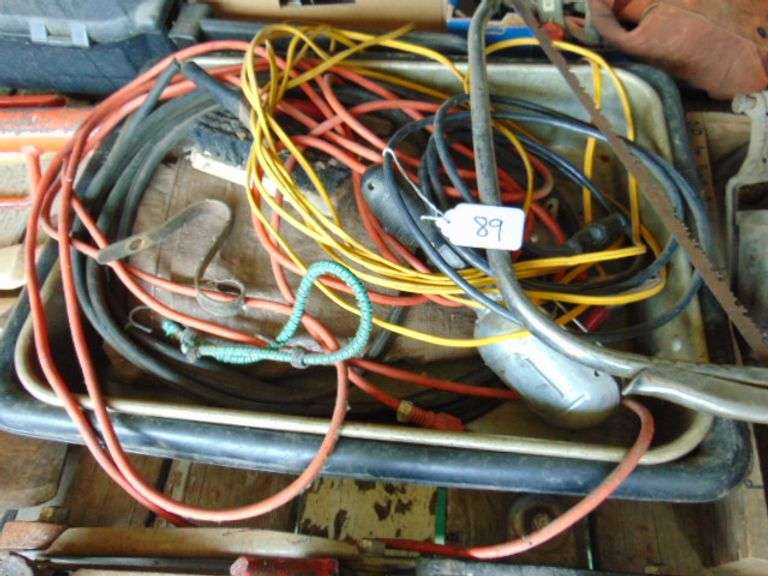 ELECT CORDS, TROUBLE LIGHT, TARP, SAW AND OIL PANS