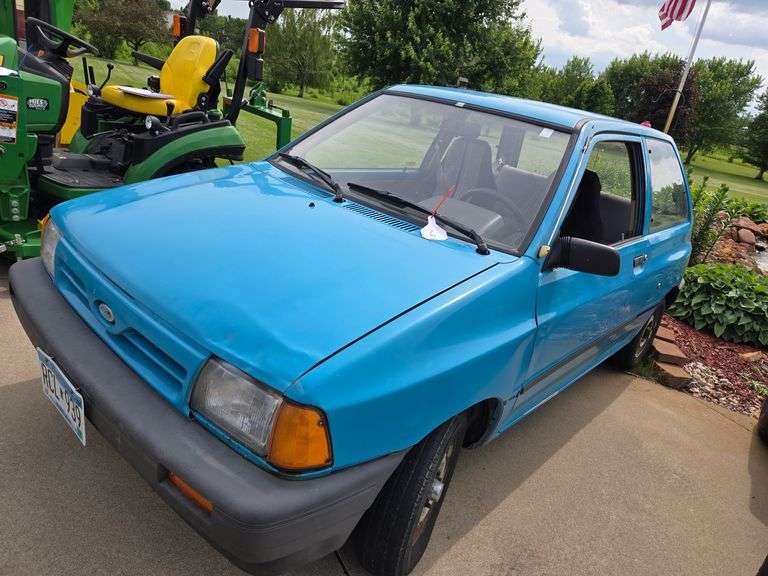 1990 FORD FESTIVA, 2 DOOR, HATCHBACK 4CYL, 5 SPD, FWD, 220,000 MILES, RUNS GOOD