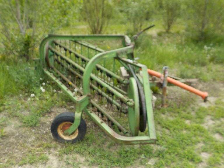 JOHN DEERE MODEL 350 RAKE, PTO DRIVE, NEEDS REPAIR ON ONE SIDE OF DRIVE, FOUR BARS, LOCATION LABOLT SD, JIM 605-467-1597
