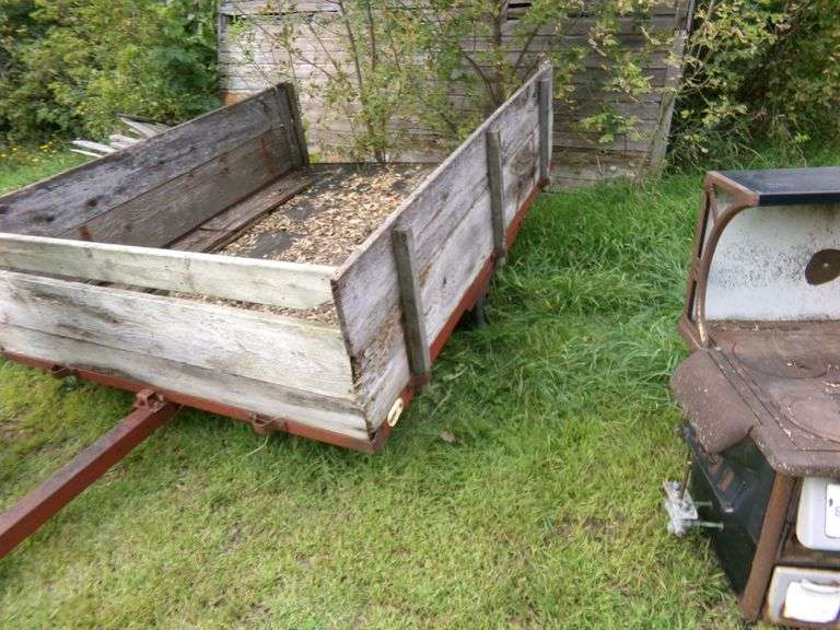 6'X8' 2 WHEEL TRAILER, 2' WOOD SIDES TILT BED