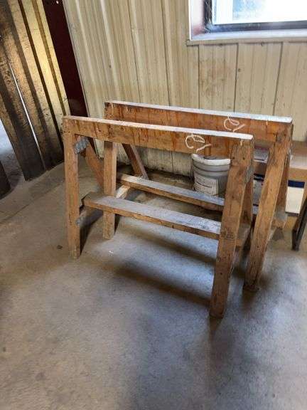 Two wood saw horses 