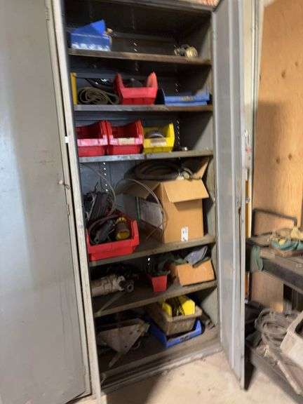 Metal storage cabinet 7 foot high 36 inch wide with contents electric parts starter 
